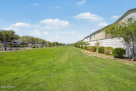 a view of a lake with a big yard