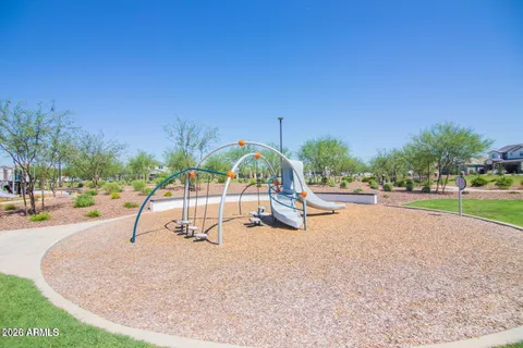 a view of a park with swings