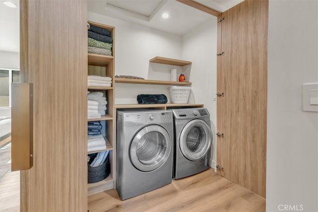 a en suite bathroom with a granite countertop tub and a sink