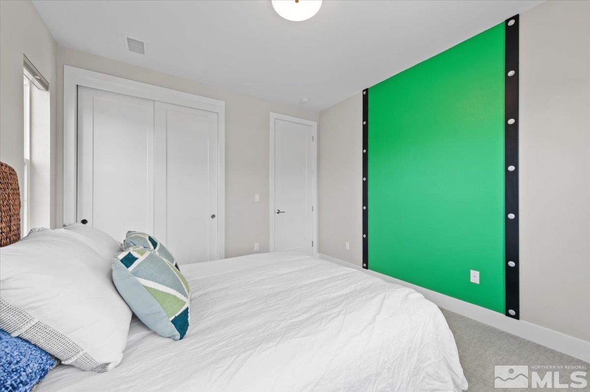8773 Larkhaven Trail Reno, NV 89523 - Photo 28 of 38 a bedroom with a bed and a window