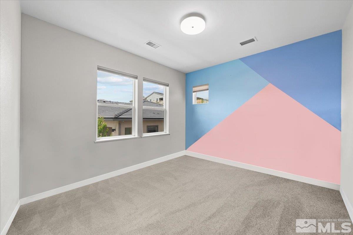 8773 Larkhaven Trail Reno, NV 89523 - Photo 30 of 38 an empty room with windows