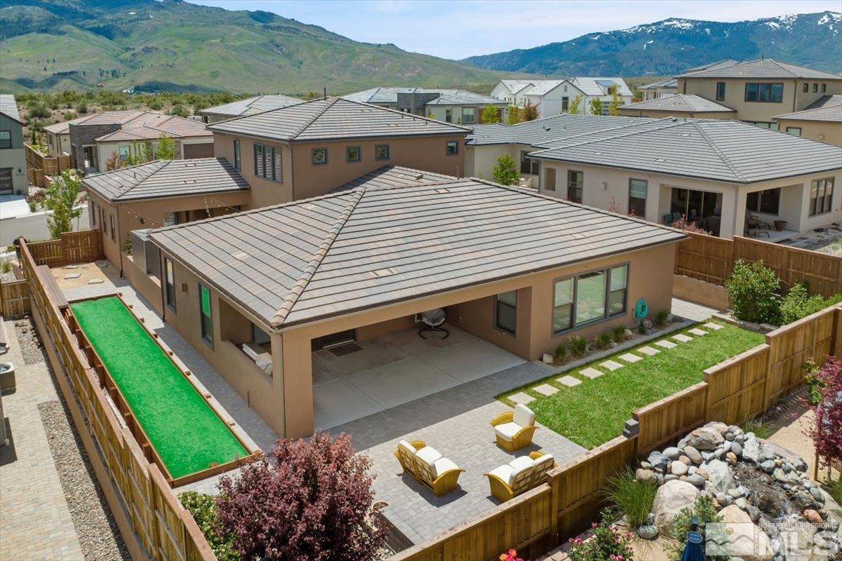 8773 Larkhaven Trail Reno, NV 89523 - Photo 5 of 38 an aerial view of a house with a yard