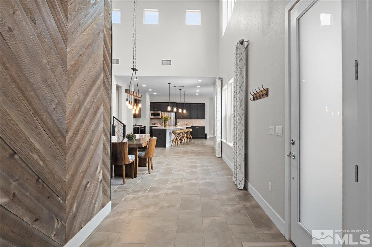 8773 Larkhaven Trail Reno, NV 89523 - Photo 7 of 38 a view of a hallway with seating space