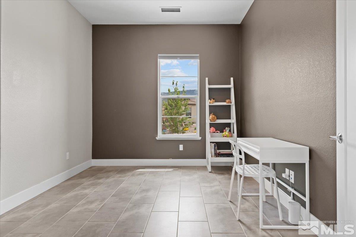8773 Larkhaven Trail Reno, NV 89523 - Photo 8 of 38 a view of workspace with furniture and window