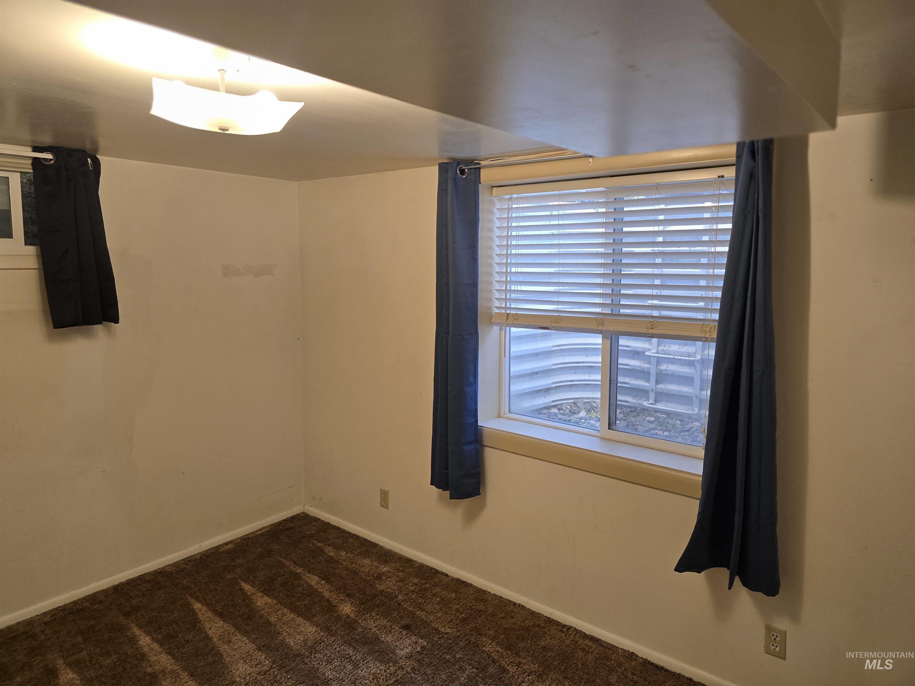 1818 Granada Drive Twin Falls, ID 83301 - Photo 13 of 16 Unfurnished room featuring carpet and baseboards