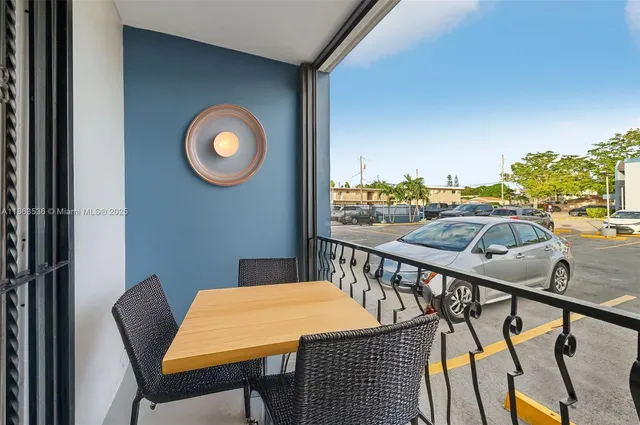 a view of a hardwood & utility room