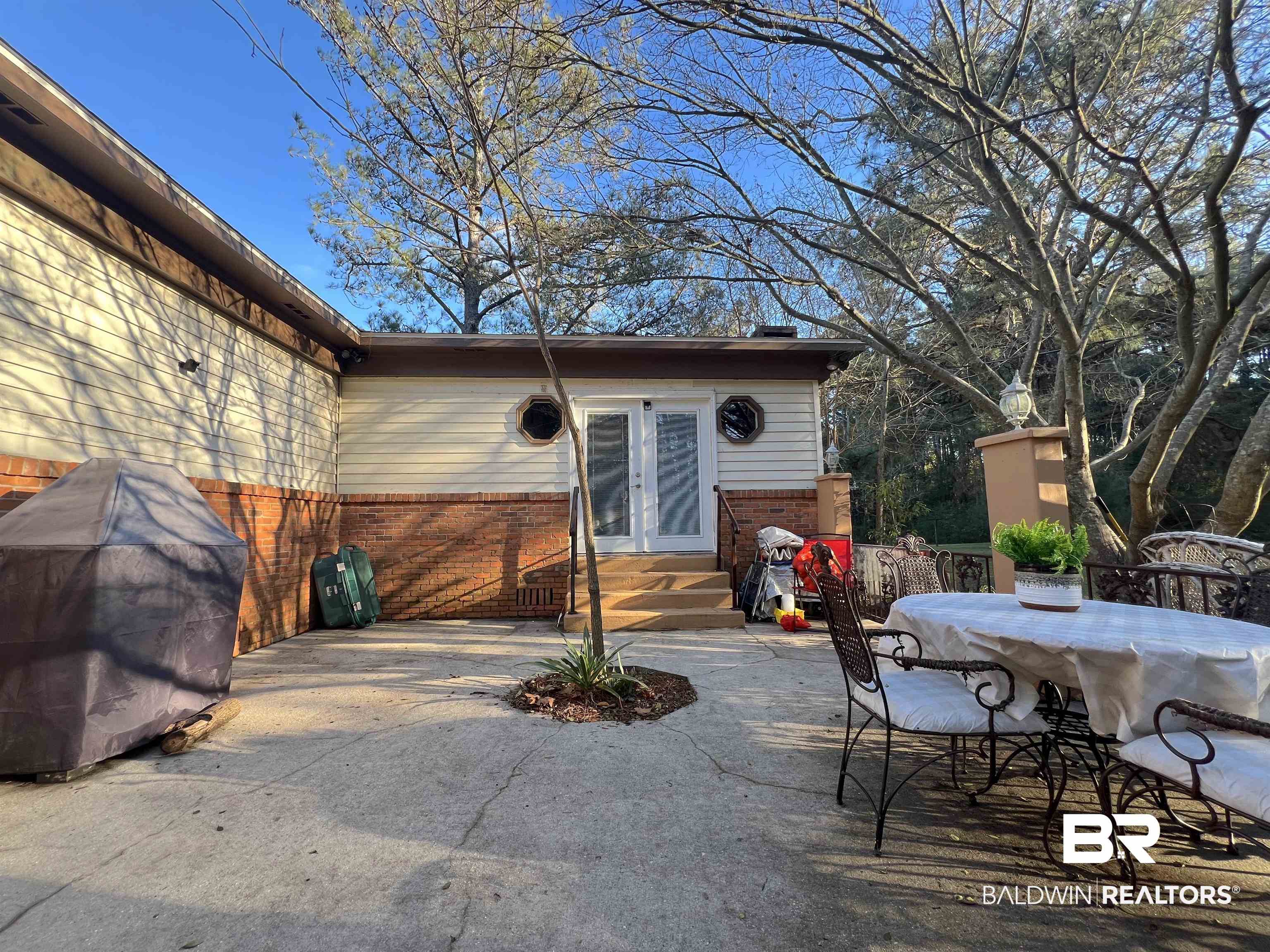 13301 A Hugh Fort Road Grand Bay, AL 36541 - Photo 22 of 34 View of patio with french doors