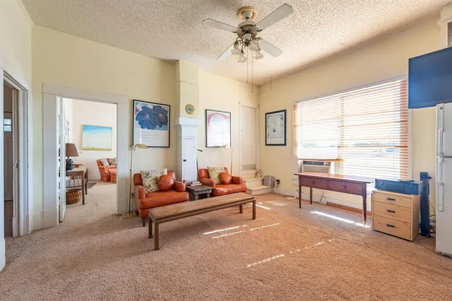 a view of a dining room with furniture