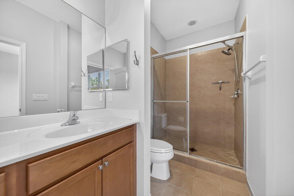 9515 Southwest Otter Lane Stuart, FL 34997 - Photo 16 of 27 primarybath1.jpg-SMALL