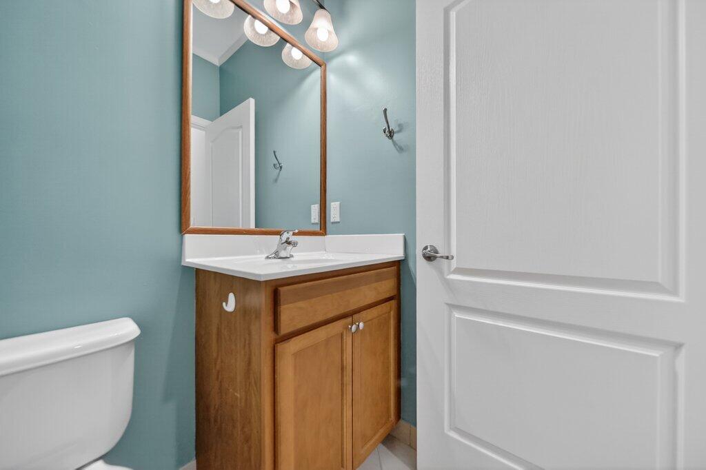 9515 Southwest Otter Lane Stuart, FL 34997 - Photo 3 of 27 halfbath1.jpg-SMALL