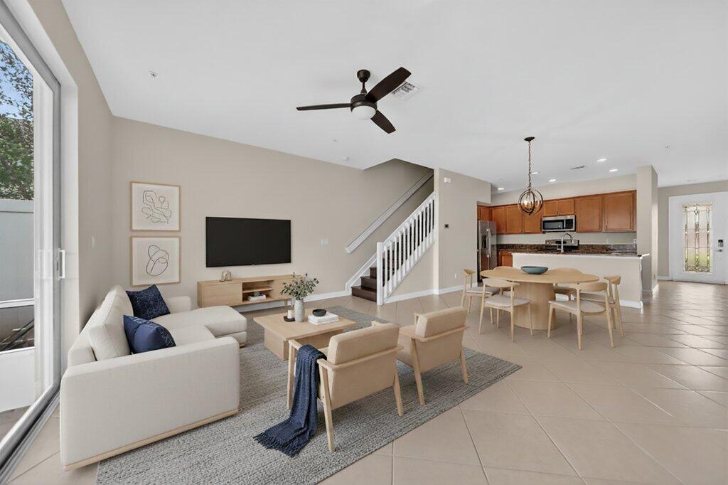 9515 Southwest Otter Lane Stuart, FL 34997 - Photo 4 of 27 openlivingstaged1.jpg-SMALL