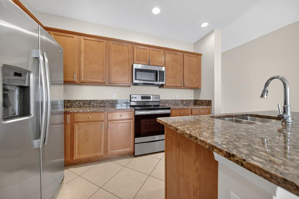 9515 Southwest Otter Lane Stuart, FL 34997 - Photo 7 of 27 kitchen1.jpg-SMALL