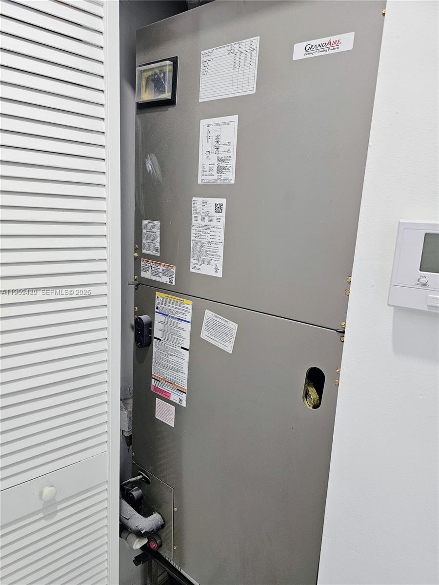 15581 Southwest 144th Court Miami, FL 33177 - Photo 30 of 37 a view of a hallway with workspace