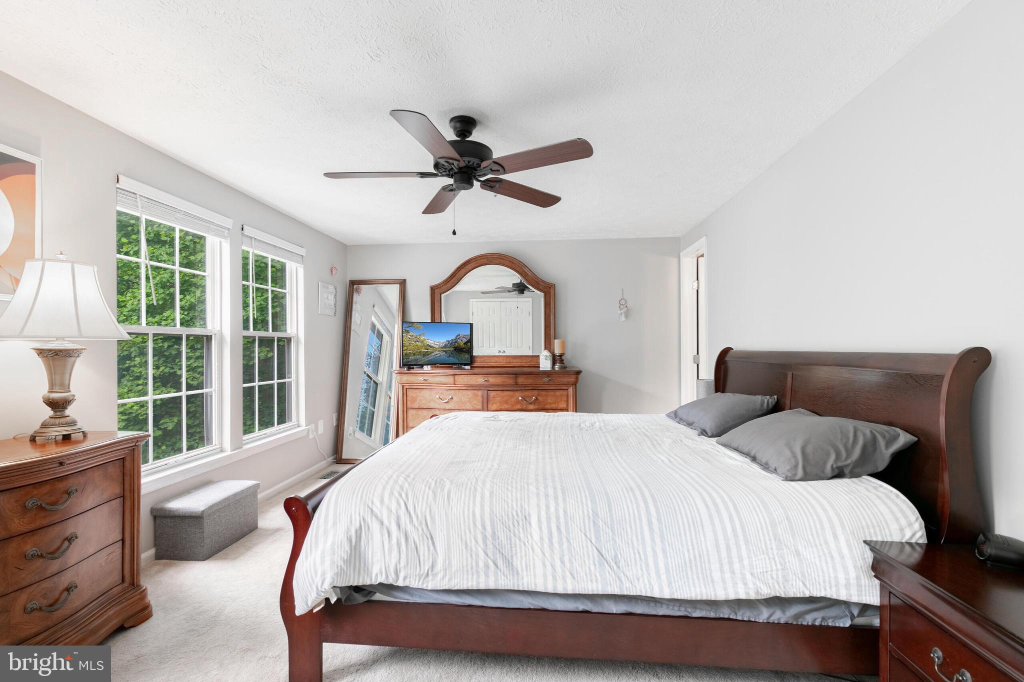 6058 Weekend Way, Unit G38 Columbia, MD 21044 - Photo 19 of 33 a bedroom with a large bed and a large window