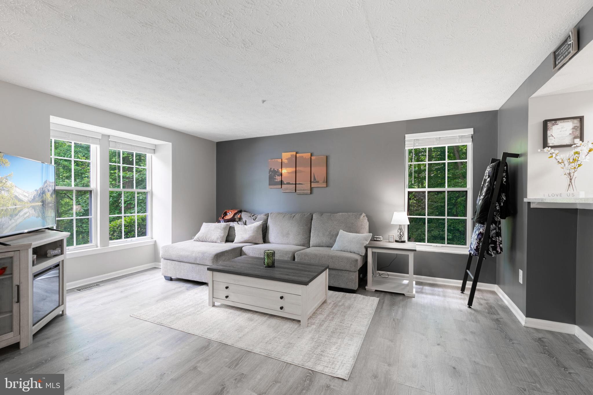 6058 Weekend Way, Unit G38 Columbia, MD 21044 - Photo 6 of 33 a living room with furniture and a window