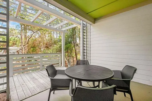 a view of a outdoor space with a table and chairs