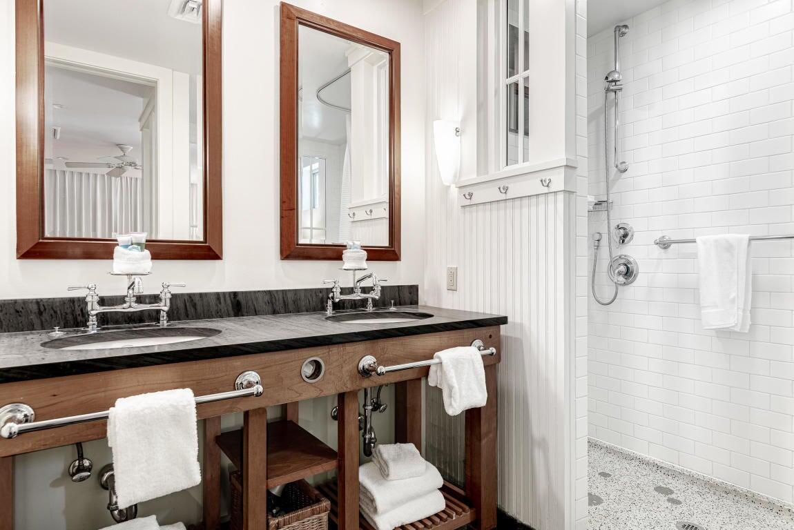 29 Goldenrod Circle, Unit 2014 Santa Rosa Beach, FL 32459 - Photo 6 of 19 a bathroom with a sink and a mirror