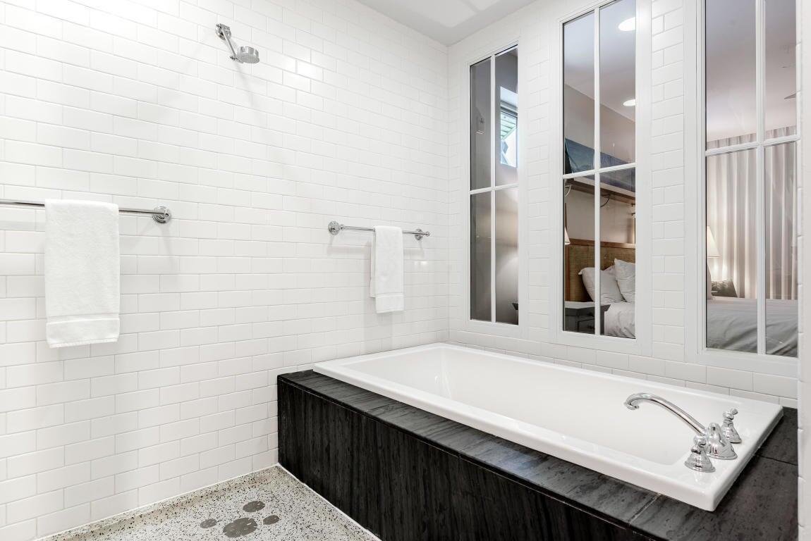 29 Goldenrod Circle, Unit 2014 Santa Rosa Beach, FL 32459 - Photo 7 of 19 a bathroom with a sink and a mirror