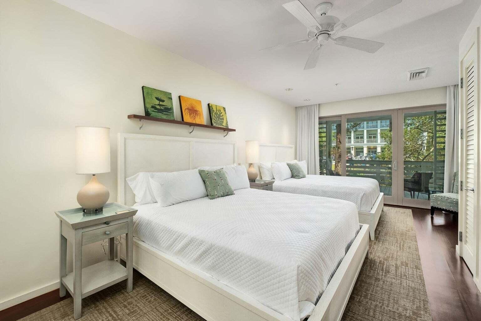 29 Goldenrod Circle, Unit 2014 Santa Rosa Beach, FL 32459 - Photo 8 of 19 a bedroom with a bed and large window