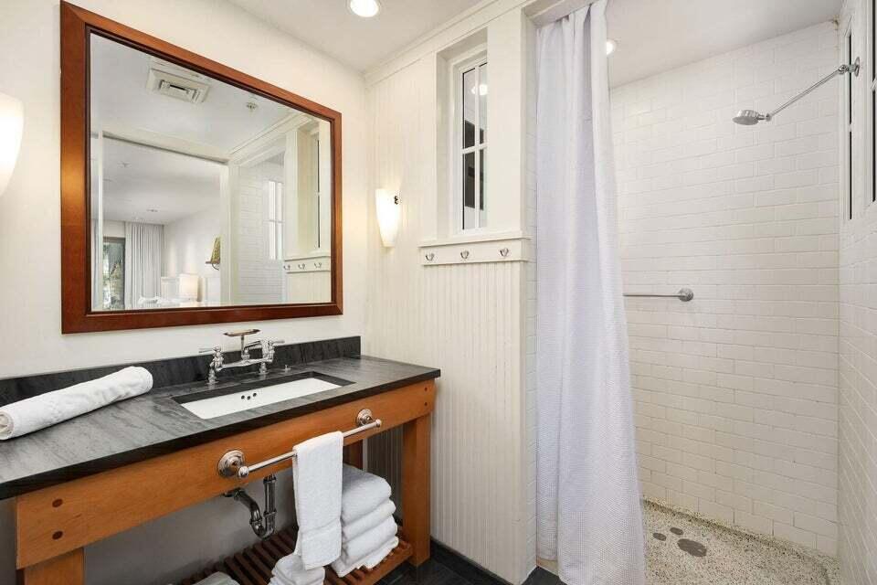 29 Goldenrod Circle, Unit 2014 Santa Rosa Beach, FL 32459 - Photo 10 of 19 a bathroom with a sink and a mirror