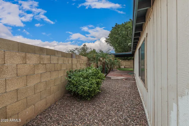 a view of a terrace with a garden