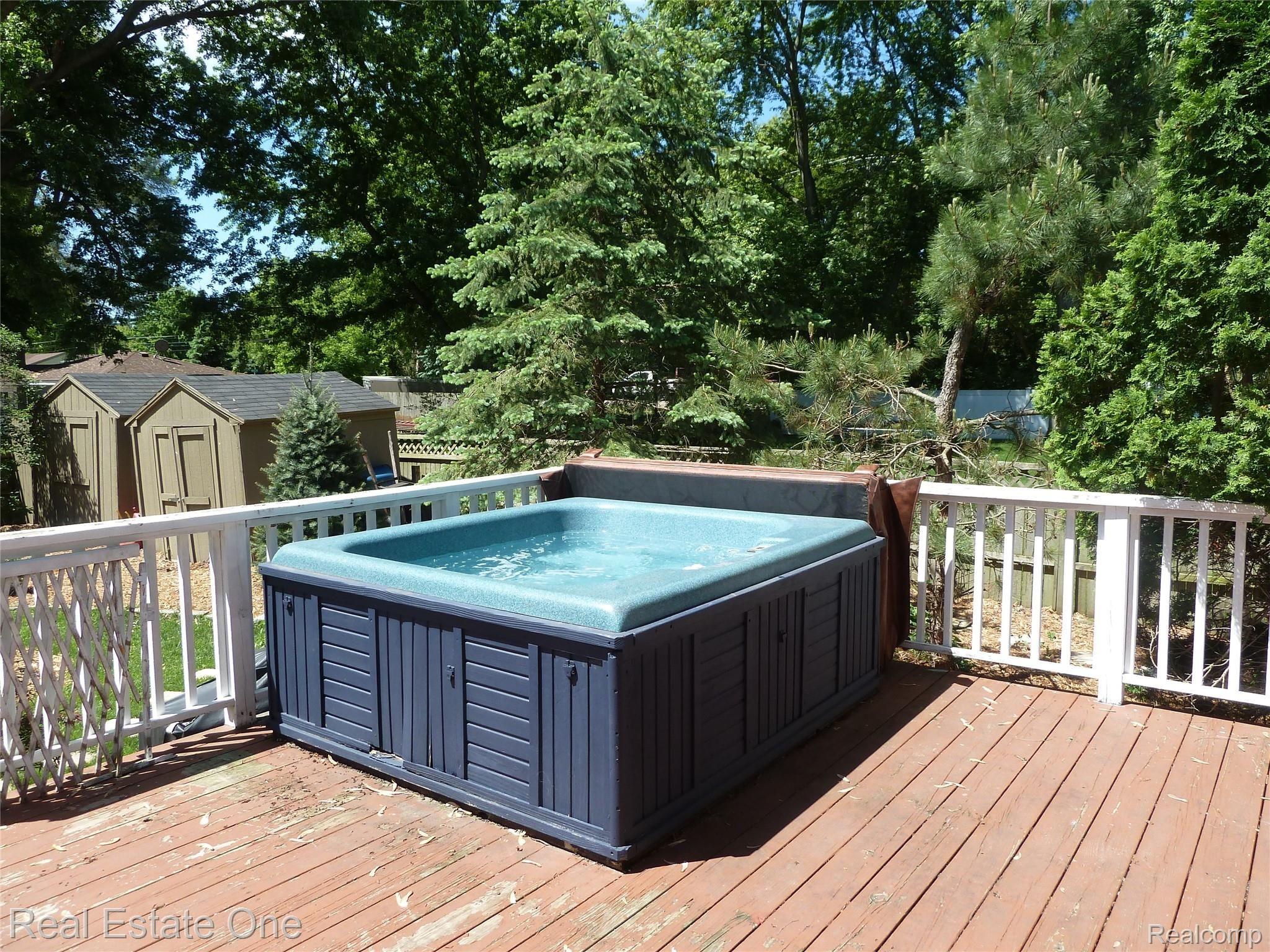1775 Medler Road Commerce Township, MI 48382 - Photo 18 of 36 Hot Tub located on the back deck (deck will be painted)