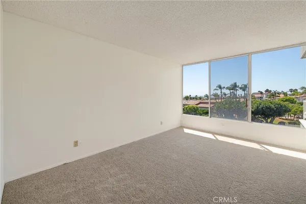 a view of a room next to a window