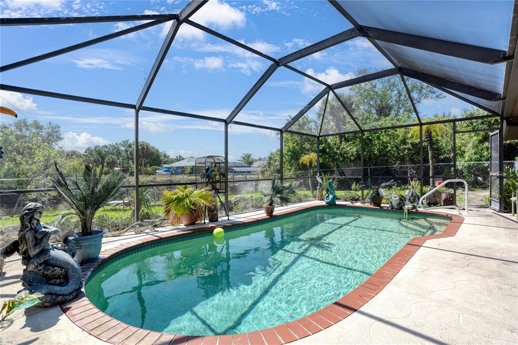 268 Cory Street Port Charlotte, FL 33953 - Photo 23 of 25 a view of a backyard with sitting area