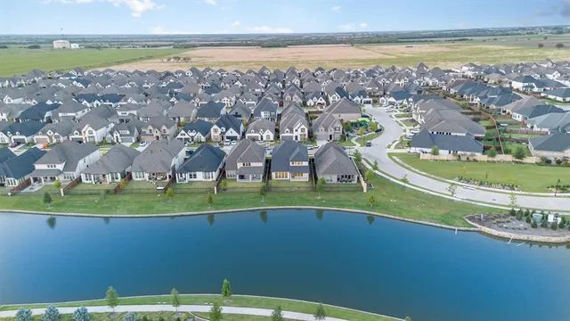 a bathroom with a bathtub a sink a mirror a vanity and a bathtub