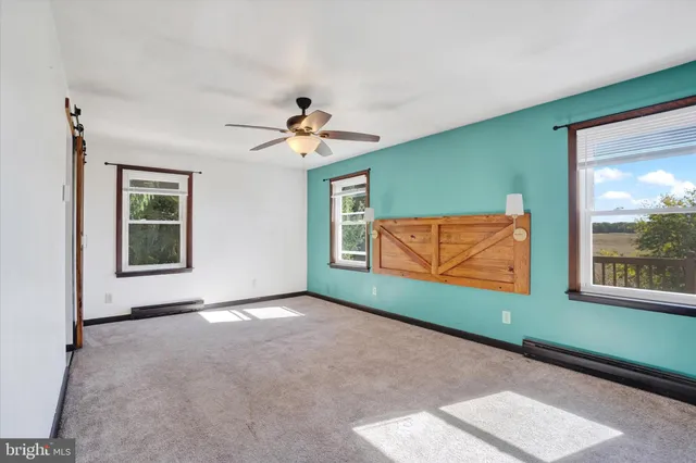 a bathroom with a sink a mirror and a bathtub