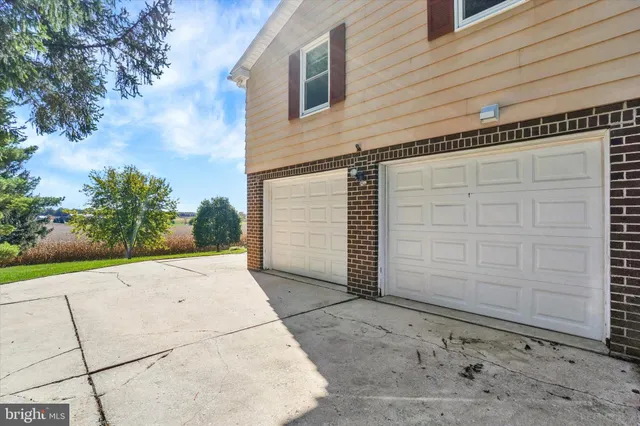 front view of a house with a big yard
