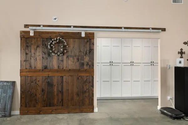 a view of front door with wooden floor