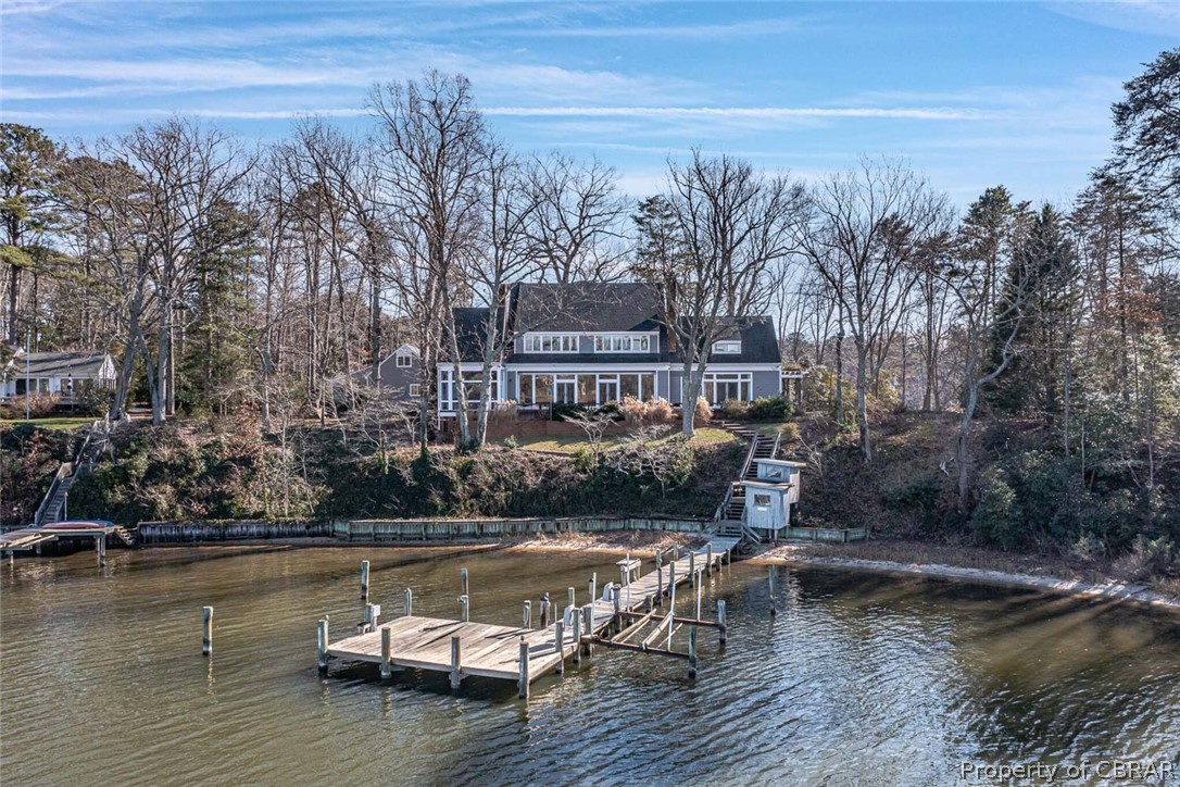 1028 Blueberry Point Road White Stone, VA 22578 - Photo 1 of 49 Beautiful waterside of the home with abundant glass for spectacular views!