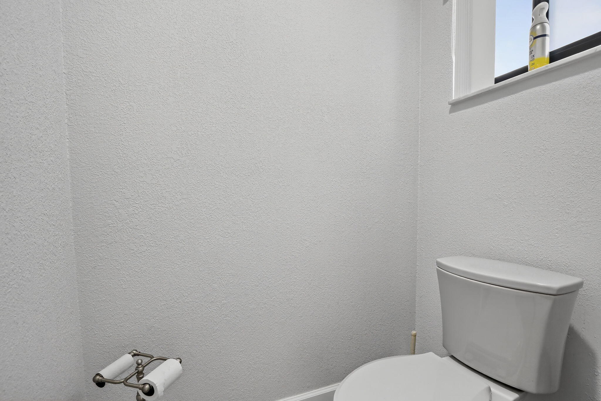13150 Southwest 16th Court Davie, FL 33325 - Photo 26 of 59 a white toilet sitting next to a white wall