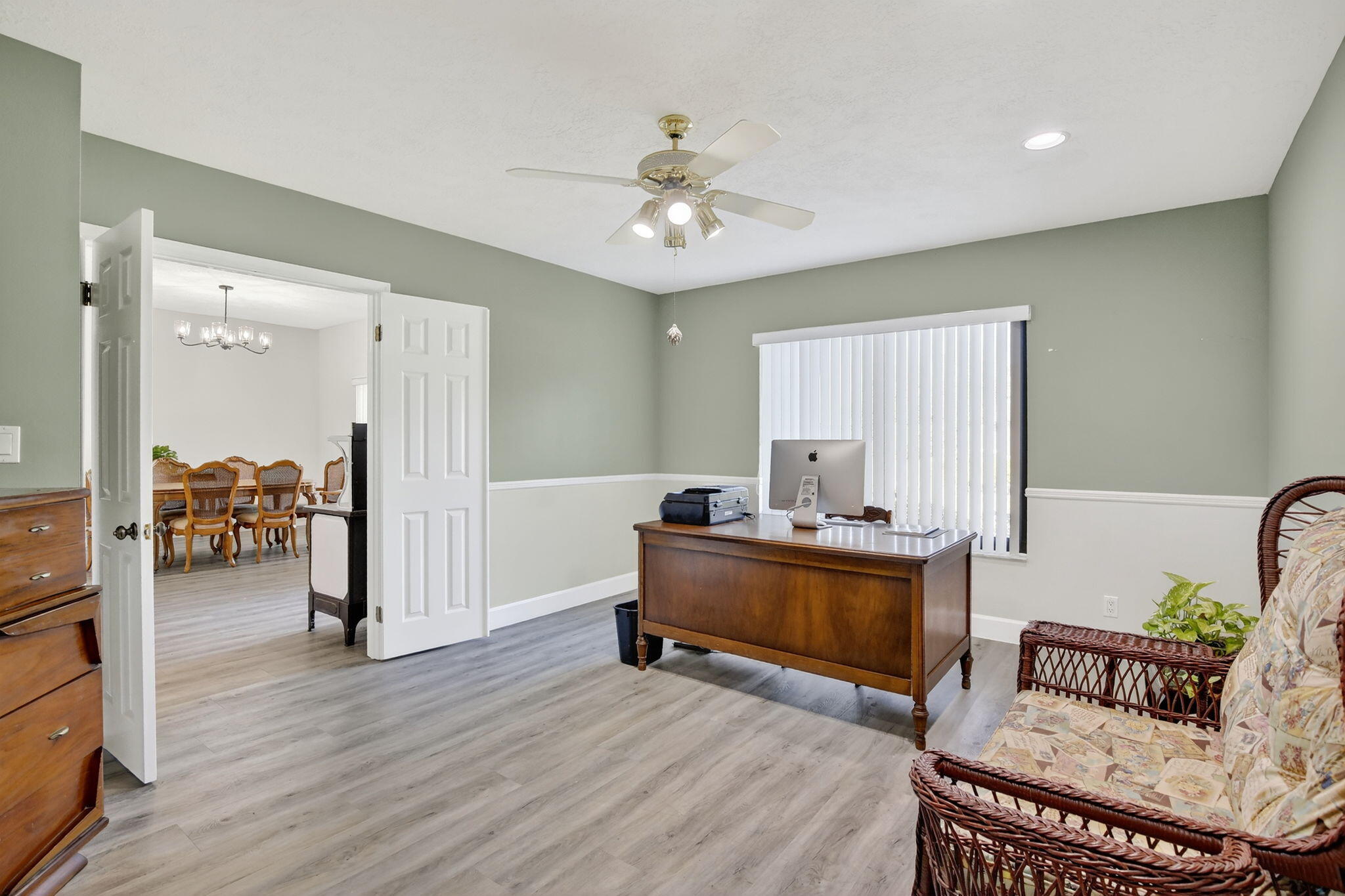13150 Southwest 16th Court Davie, FL 33325 - Photo 32 of 59 a living room with furniture and a wooden floor