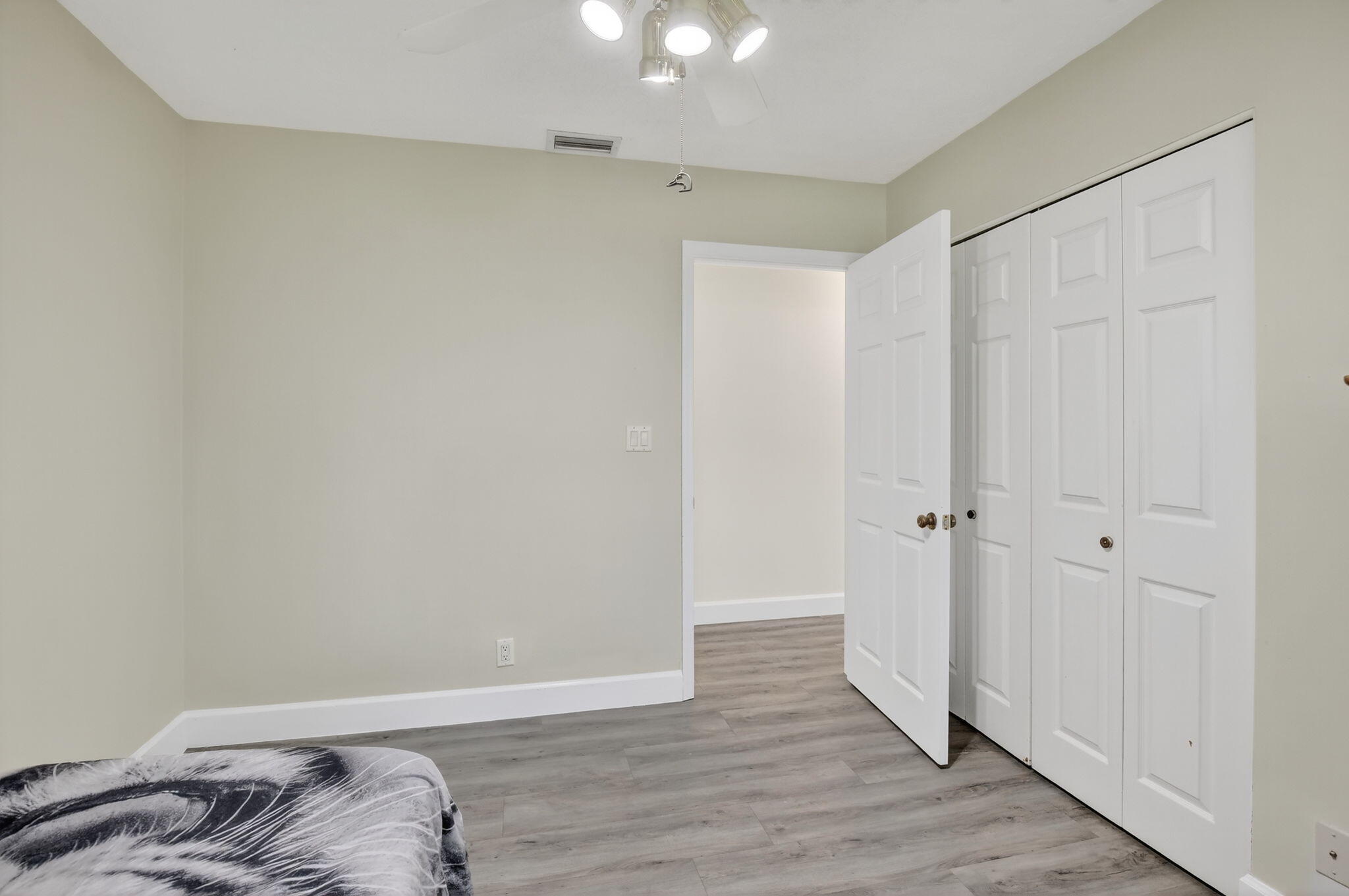 13150 Southwest 16th Court Davie, FL 33325 - Photo 34 of 59 a view of bedroom with wooden floor