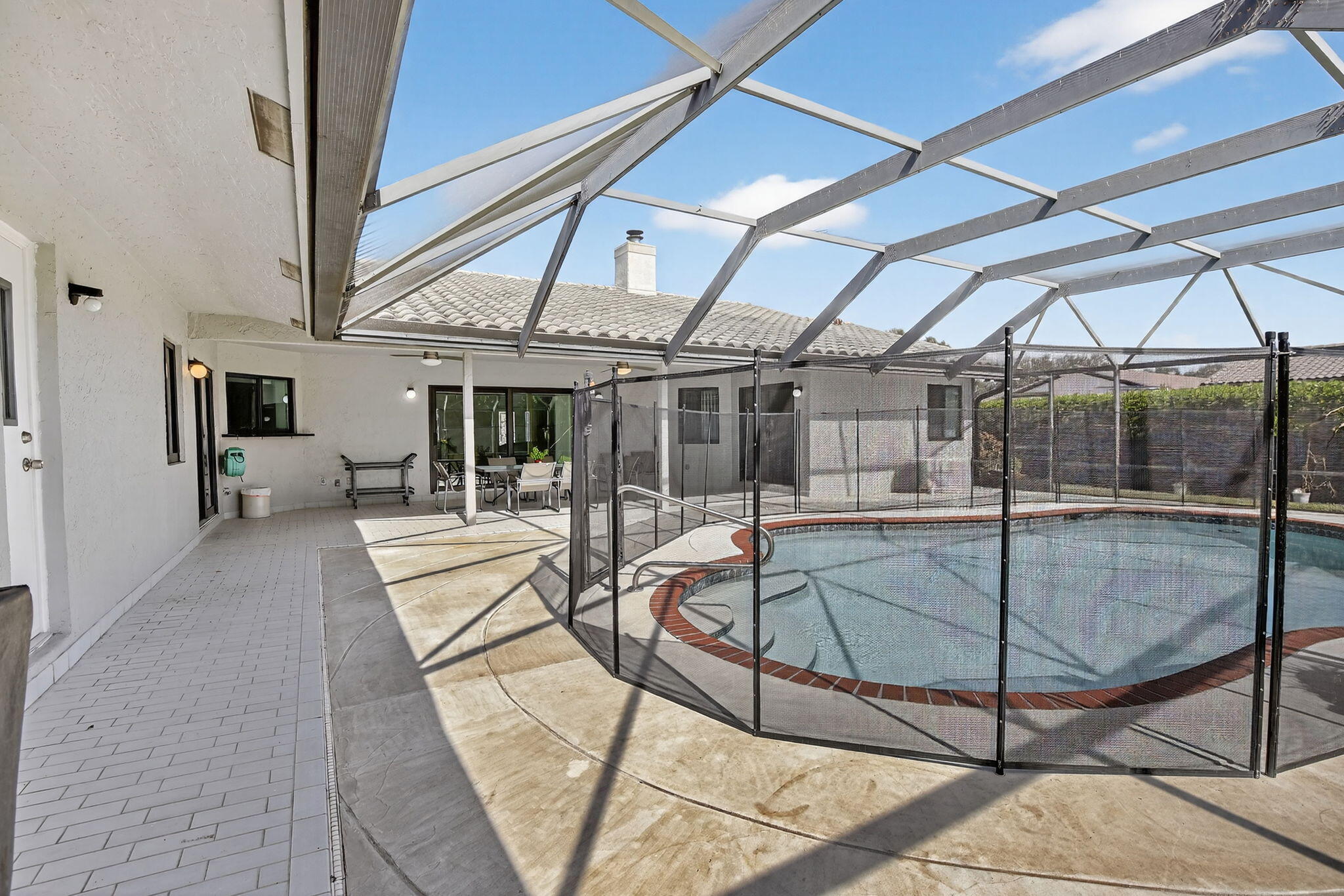 13150 Southwest 16th Court Davie, FL 33325 - Photo 42 of 59 a view of a swimming pool with a patio