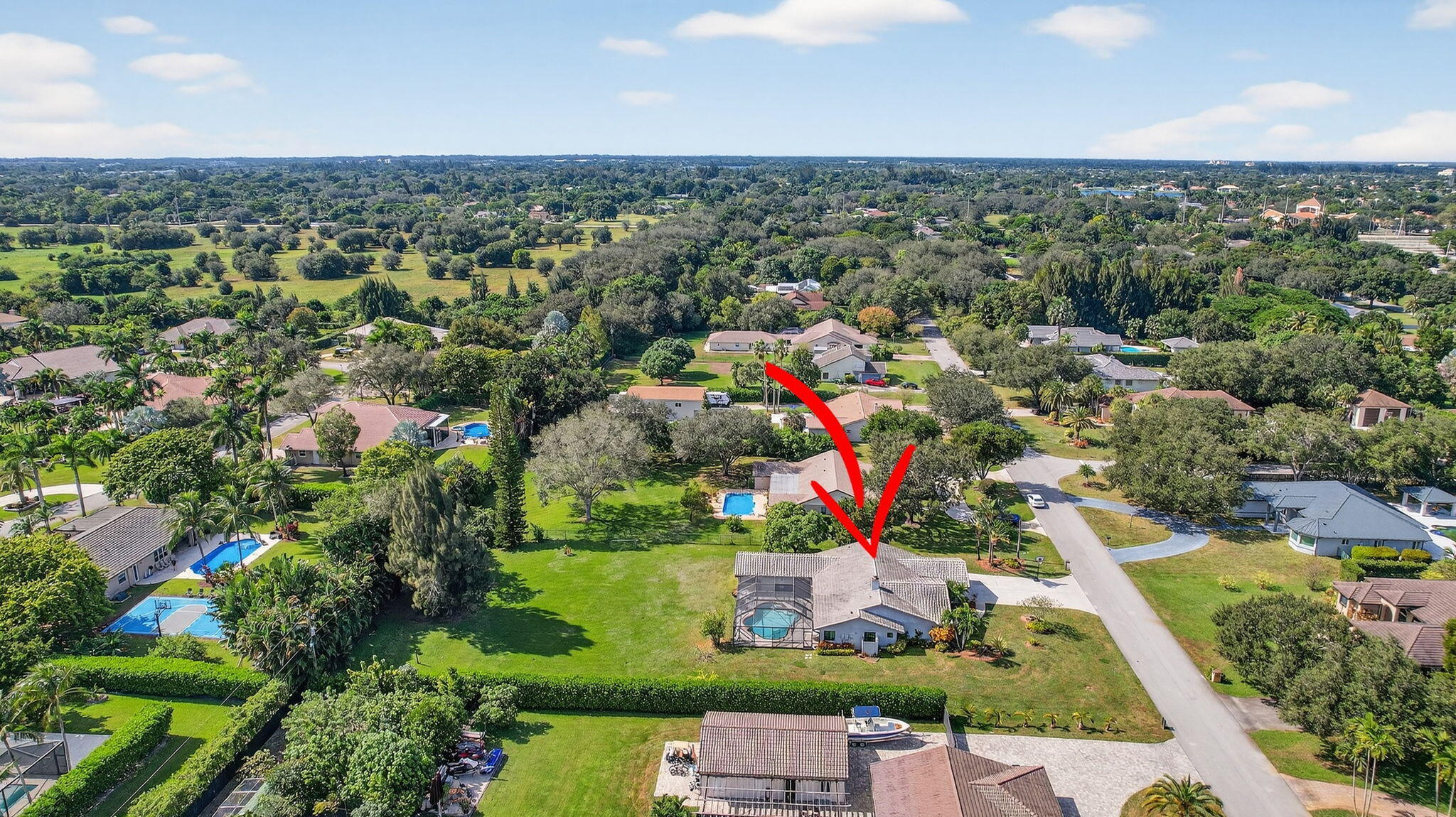 13150 Southwest 16th Court Davie, FL 33325 - Photo 52 of 59 an aerial view of residential houses with outdoor space and trees