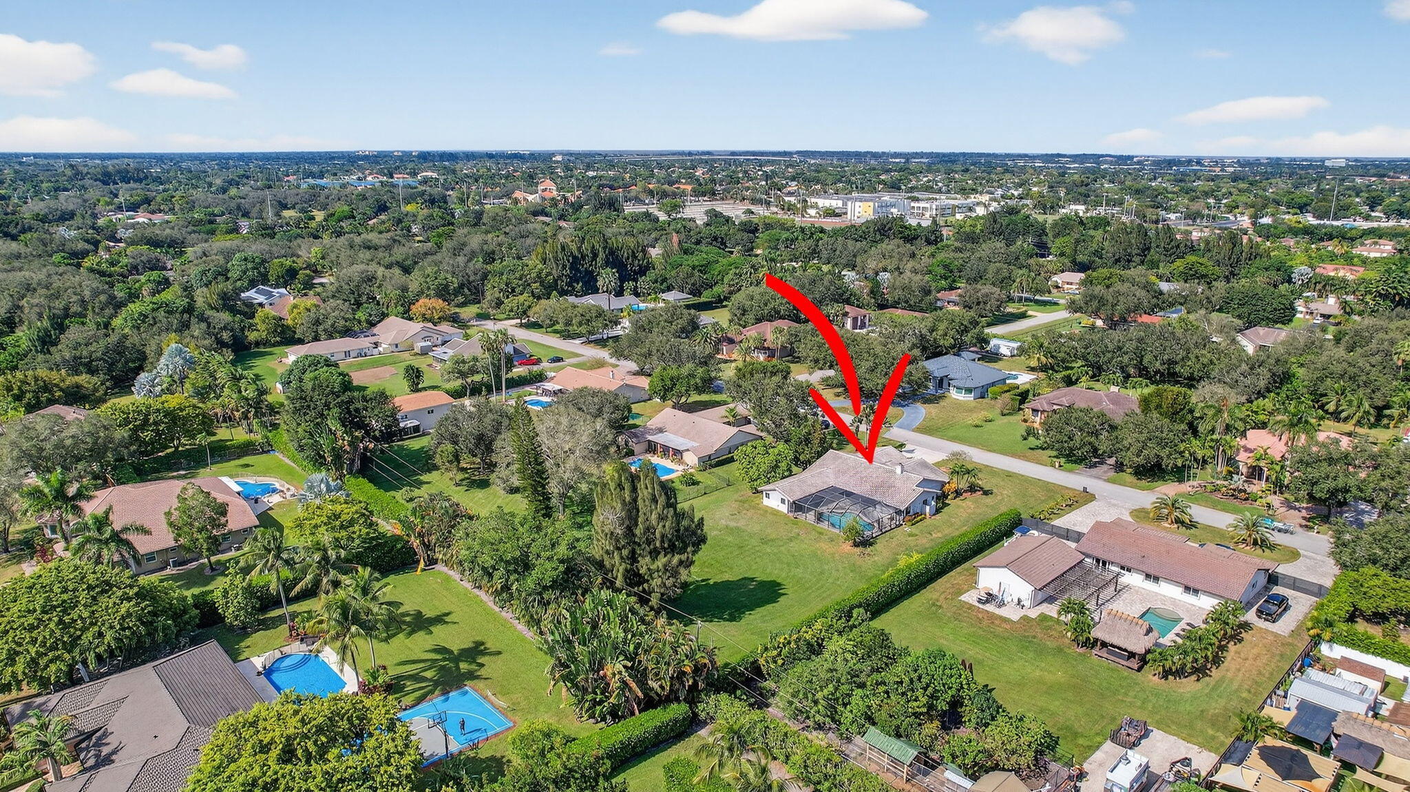 13150 Southwest 16th Court Davie, FL 33325 - Photo 53 of 59 an aerial view of residential houses with outdoor space and trees
