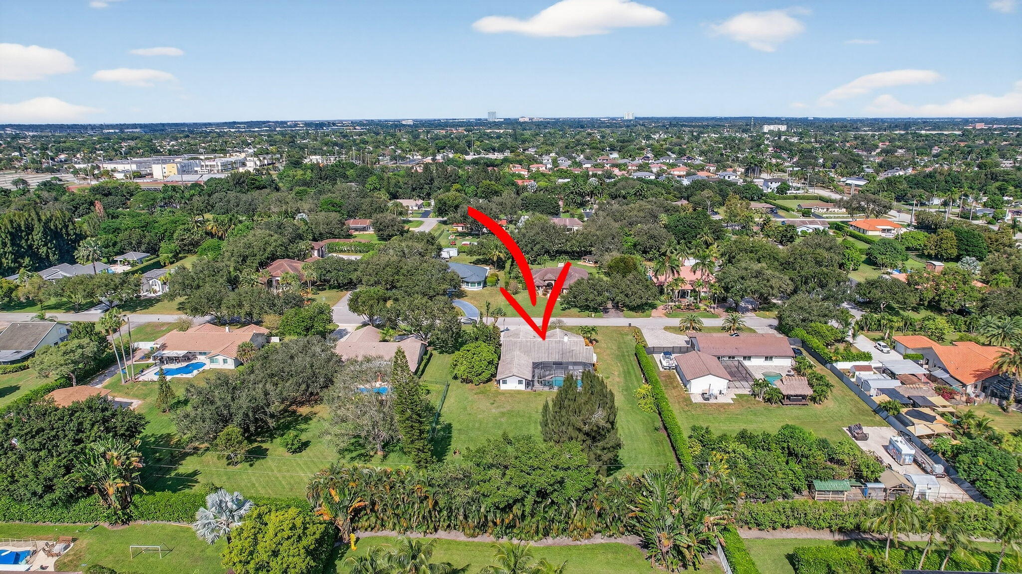 13150 Southwest 16th Court Davie, FL 33325 - Photo 56 of 59 an aerial view of residential houses with outdoor space and trees