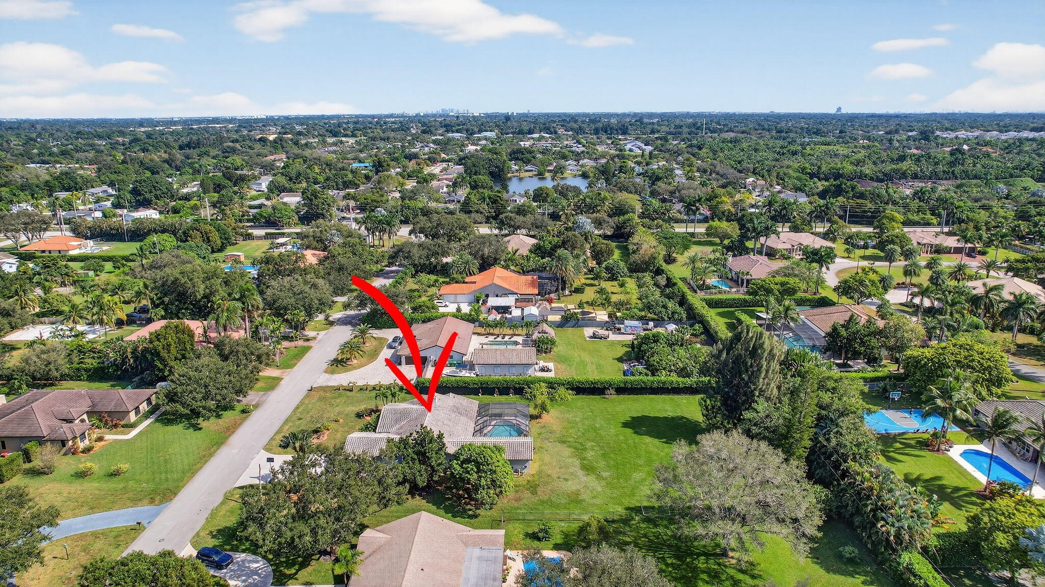 13150 Southwest 16th Court Davie, FL 33325 - Photo 57 of 59 an aerial view of residential houses with outdoor space and trees
