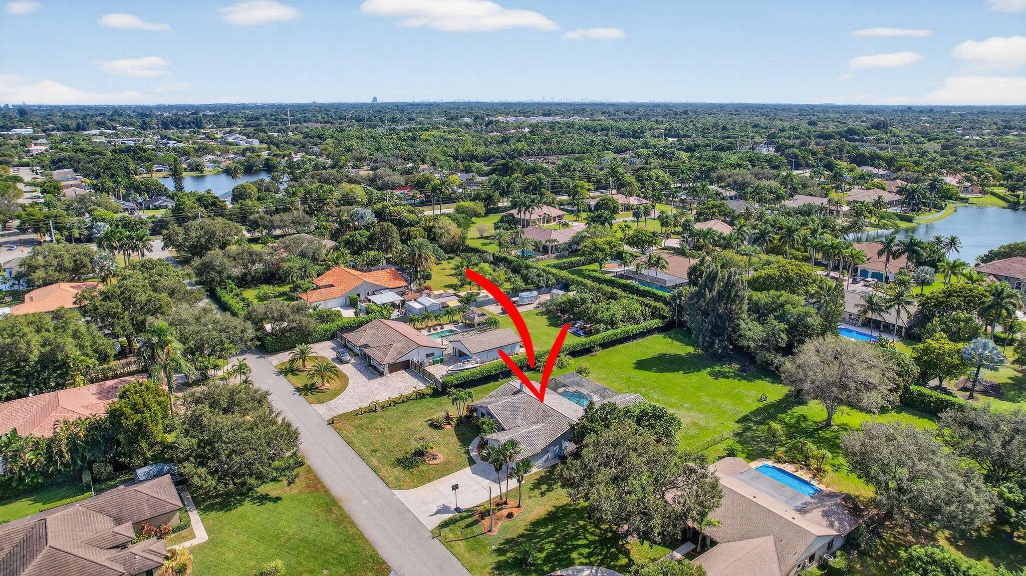 13150 Southwest 16th Court Davie, FL 33325 - Photo 58 of 59 an aerial view of residential houses with outdoor space and trees