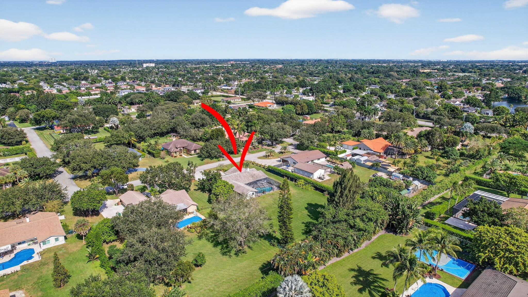 13150 Southwest 16th Court Davie, FL 33325 - Photo 59 of 59 an aerial view of residential houses with outdoor space and trees