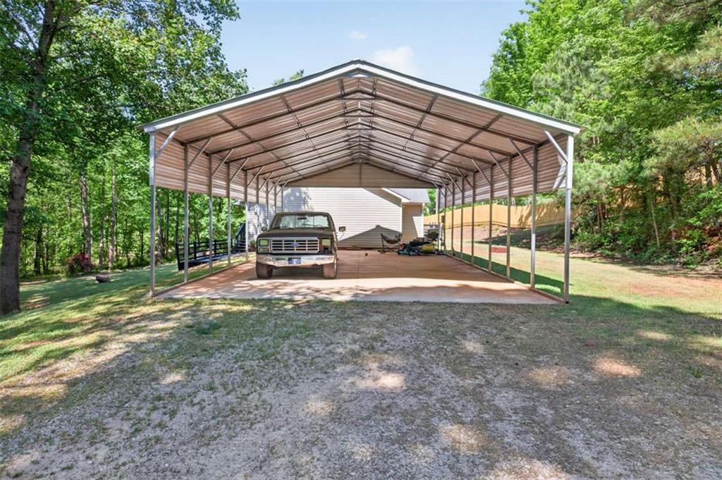 386 Ridgewood Drive Pendergrass, GA 30567 - Photo 35 of 50 a view of a house with backyard