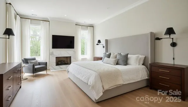 a bathroom with a bathtub sink mirror and vanity