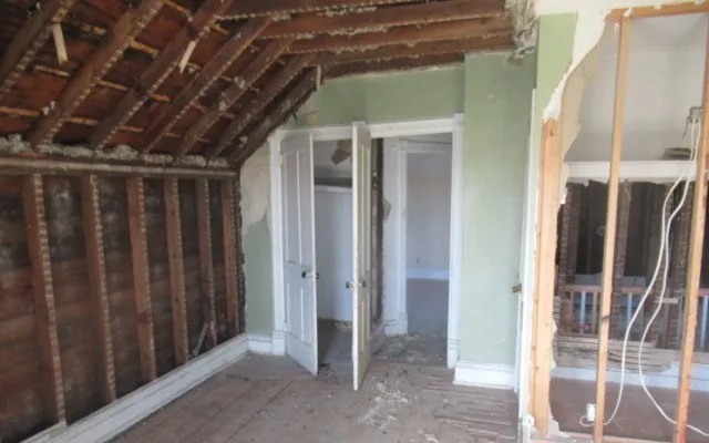 a view of entryway with wooden walls