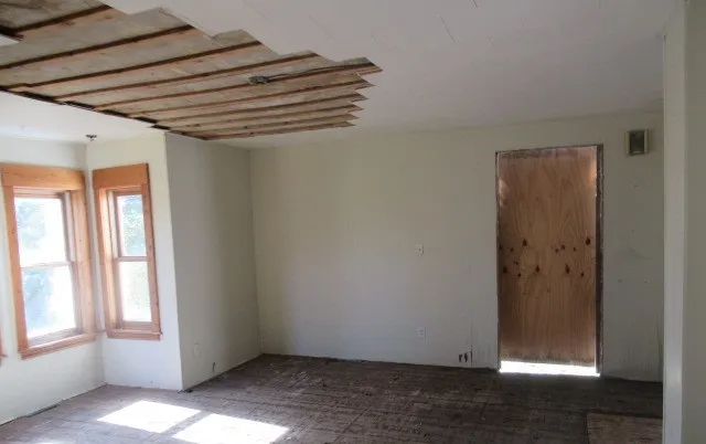 an empty room with windows