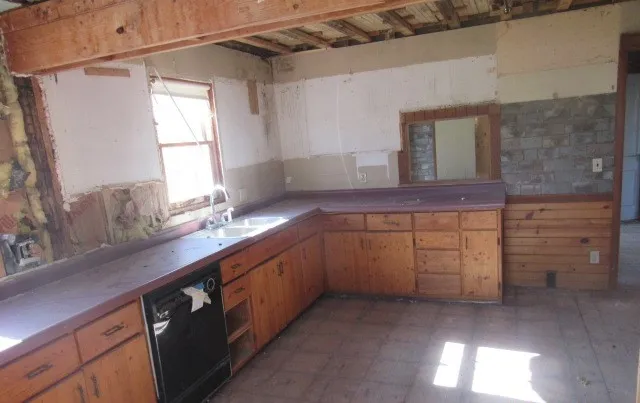 a view of cabinets and window
