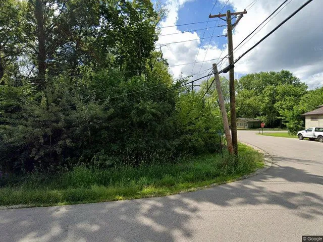 a view of street with green space