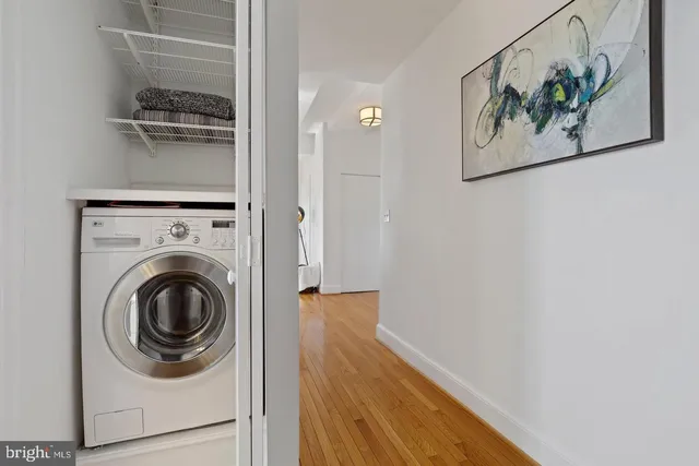 a view of closet area with empty racks